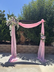 IMG 7354202 1755023378 Arch with draping and faux flowers